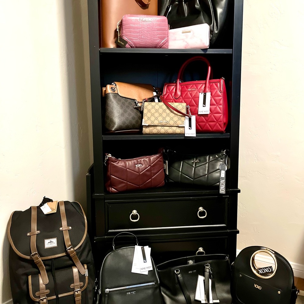 Variety of women’s handbags/backpacks/wallets